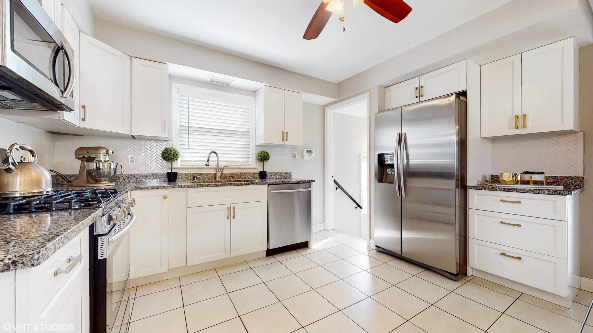 453 High Ridge Road Hillside, IL 60162 - Photo 5 of 20 a kitchen with a refrigerator sink and cabinets