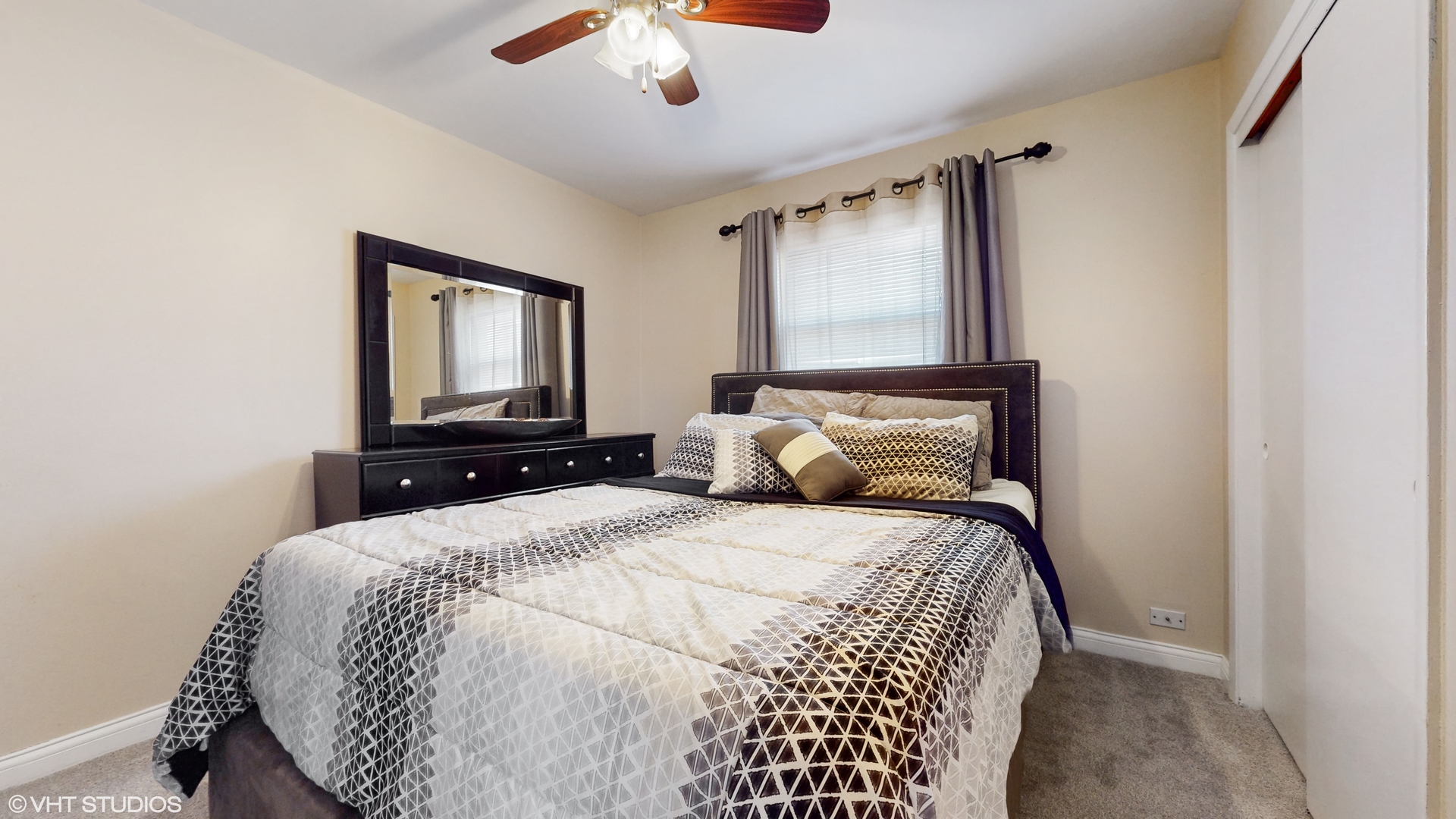 453 High Ridge Road Hillside, IL 60162 - Photo 7 of 20 a bedroom with bed and window