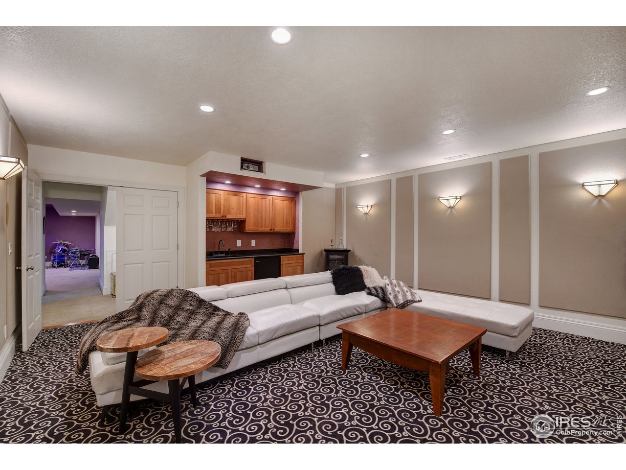 907 13th Street Boulder, CO 80302 - Photo 23 of 35 Theater room with wet bar