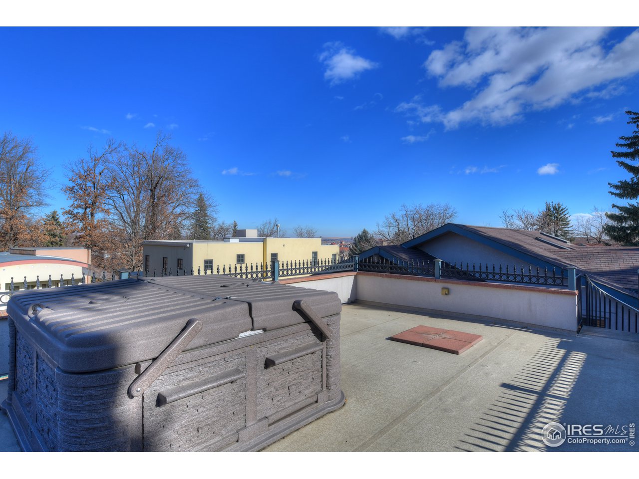 907 13th Street Boulder, CO 80302 - Photo 29 of 35 Rooftop hot tub and deck above detached garage with sweeping views