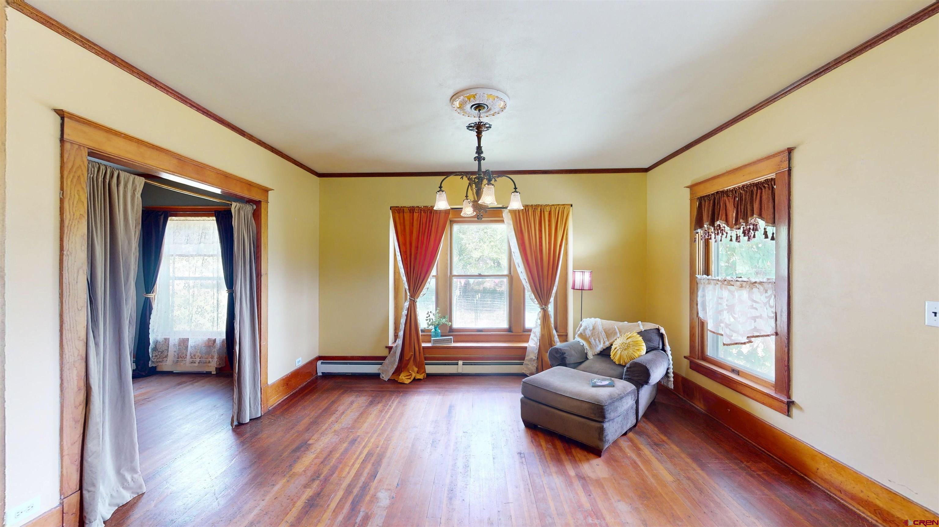 39778 Pitkin Road Paonia, CO 81428 - Photo 12 of 45 a living room with furniture and a wooden floor