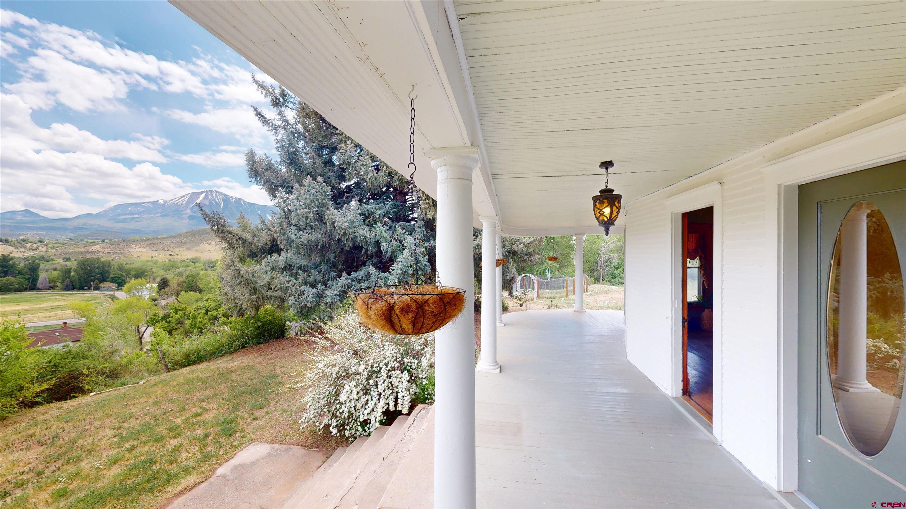 39778 Pitkin Road Paonia, CO 81428 - Photo 28 of 45 a view of a porch with furniture and garden