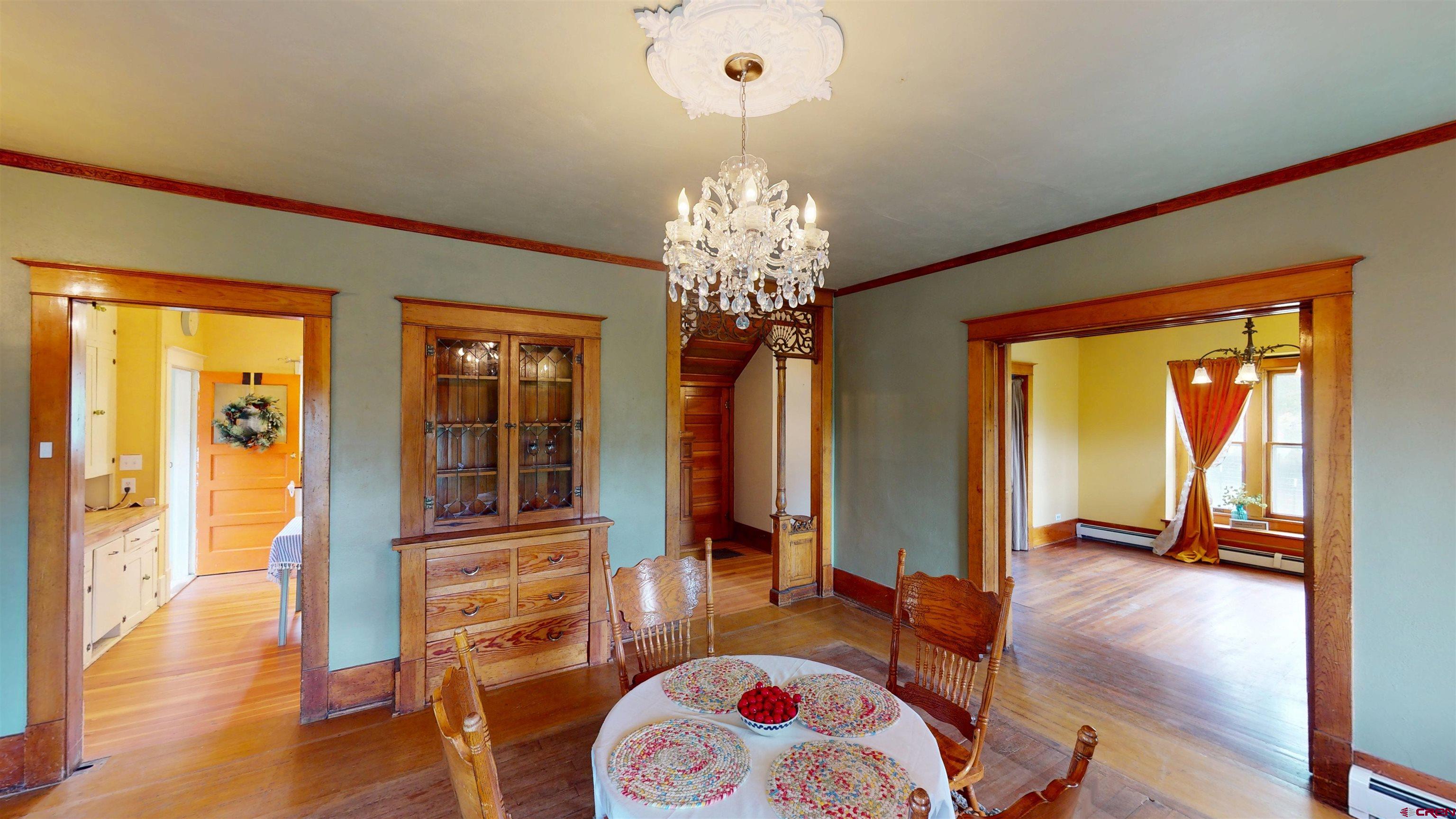 39778 Pitkin Road Paonia, CO 81428 - Photo 10 of 45 a living room with furniture and a chandelier