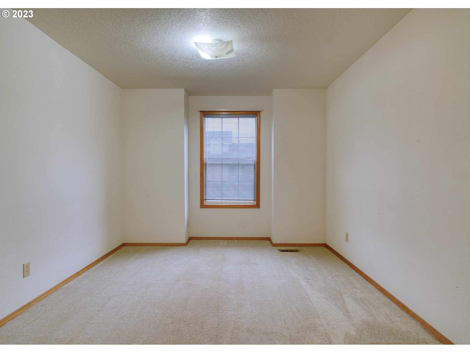 33912 Southeast Everett Way Scappoose, OR 97056 - Photo 12 of 32 an empty room with a window