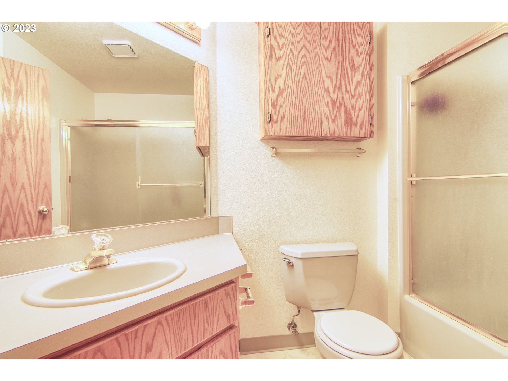 33912 Southeast Everett Way Scappoose, OR 97056 - Photo 21 of 32 a bathroom with a sink a toilet and a mirror