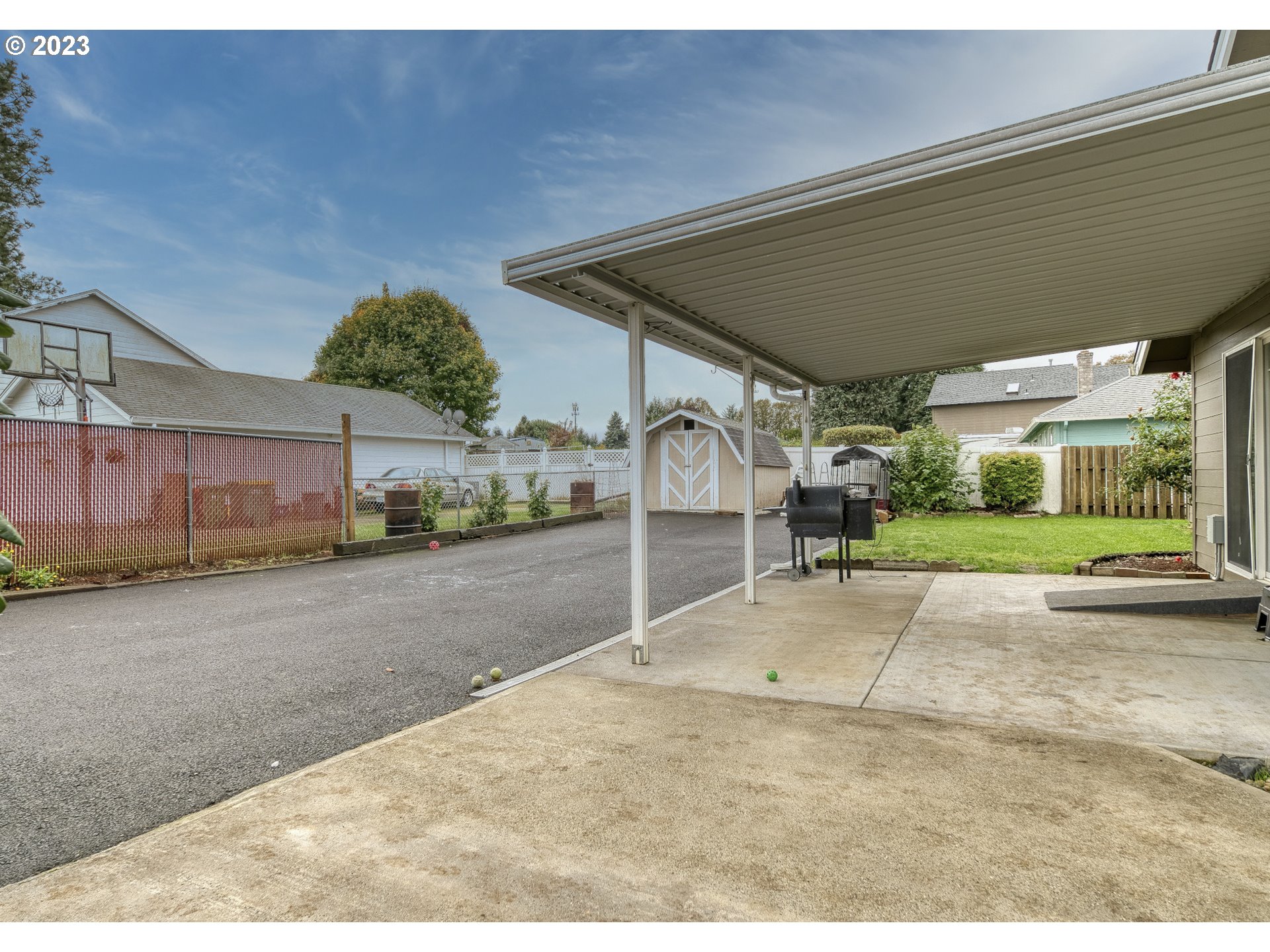 33912 Southeast Everett Way Scappoose, OR 97056 - Photo 29 of 32 a view of a house with a yard and garage