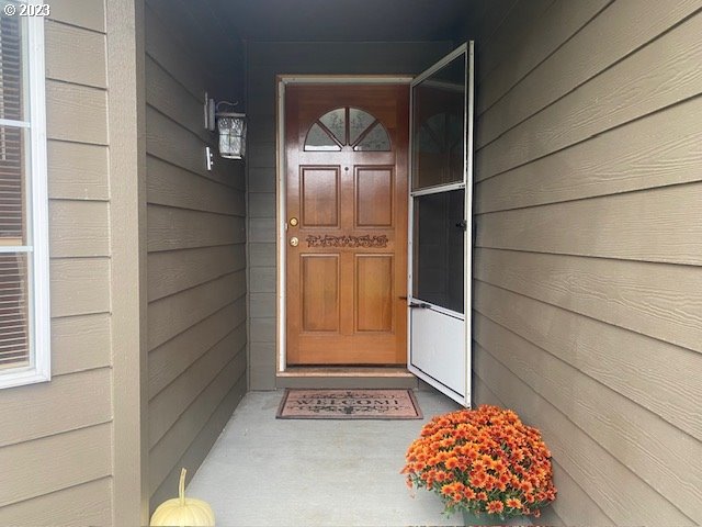 33912 Southeast Everett Way Scappoose, OR 97056 - Photo 3 of 32 a front door view of a house
