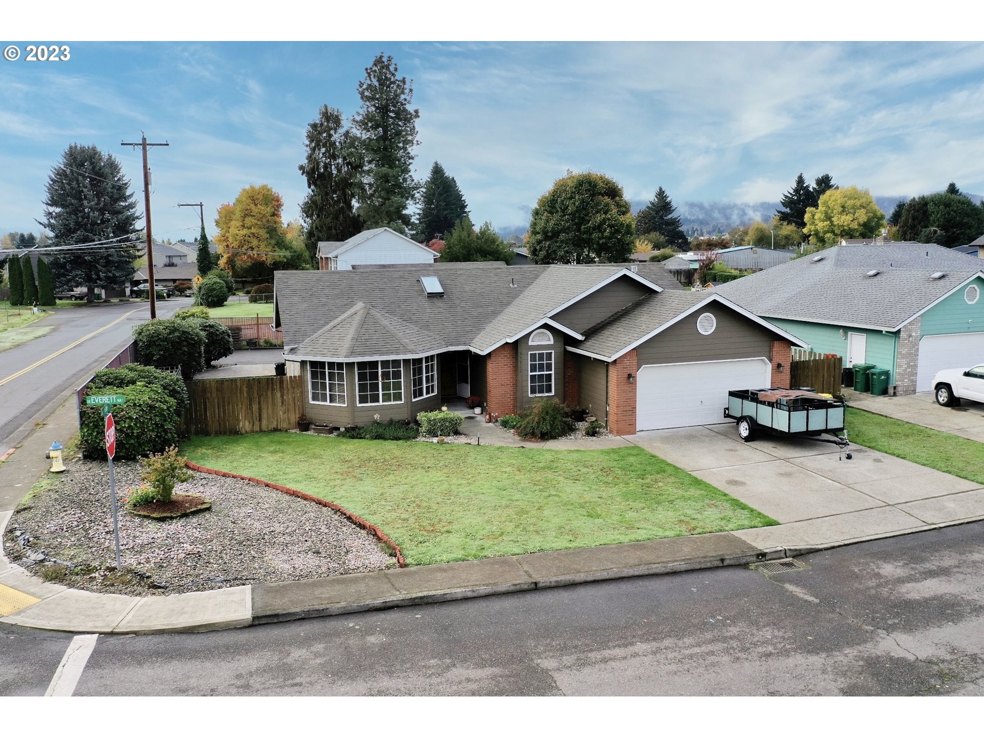 33912 Southeast Everett Way Scappoose, OR 97056 - Photo 31 of 32 a view of house with a garden