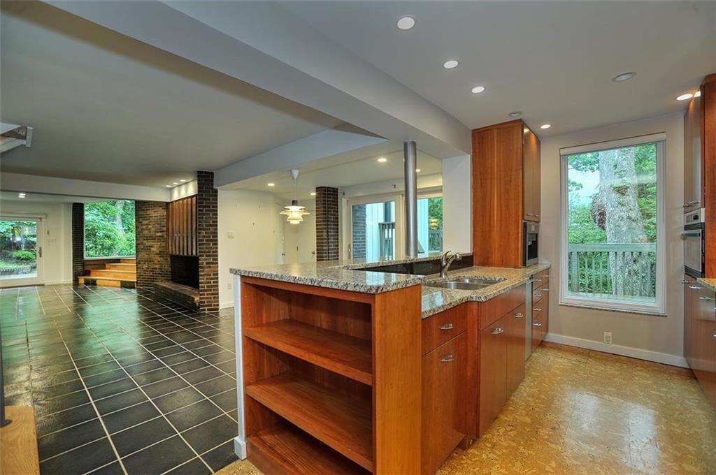 90 East Woodland Road Pittsburgh, PA 15232 - Photo 15 of 27 a kitchen with stainless steel appliances granite countertop a sink and a stove