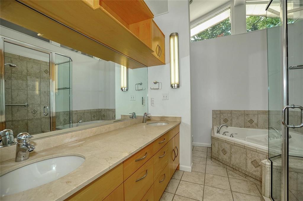 90 East Woodland Road Pittsburgh, PA 15232 - Photo 20 of 27 a bathroom with a granite countertop sink mirror and bathtub