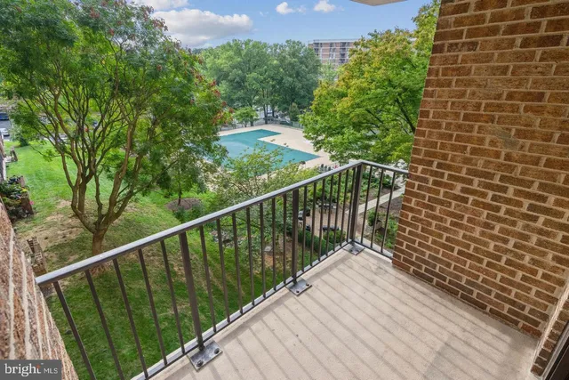 a balcony with an outdoor space