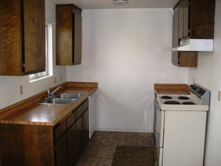 1107 Beltline Road Redding, CA 96003 - Photo 4 of 8 a kitchen with a stove and a sink