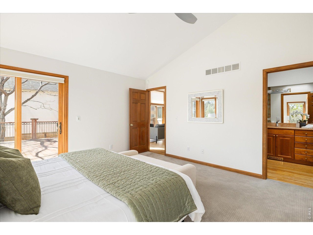 3966 Promontory Court Boulder, CO 80304 - Photo 15 of 42 a bedroom with a bed and a window