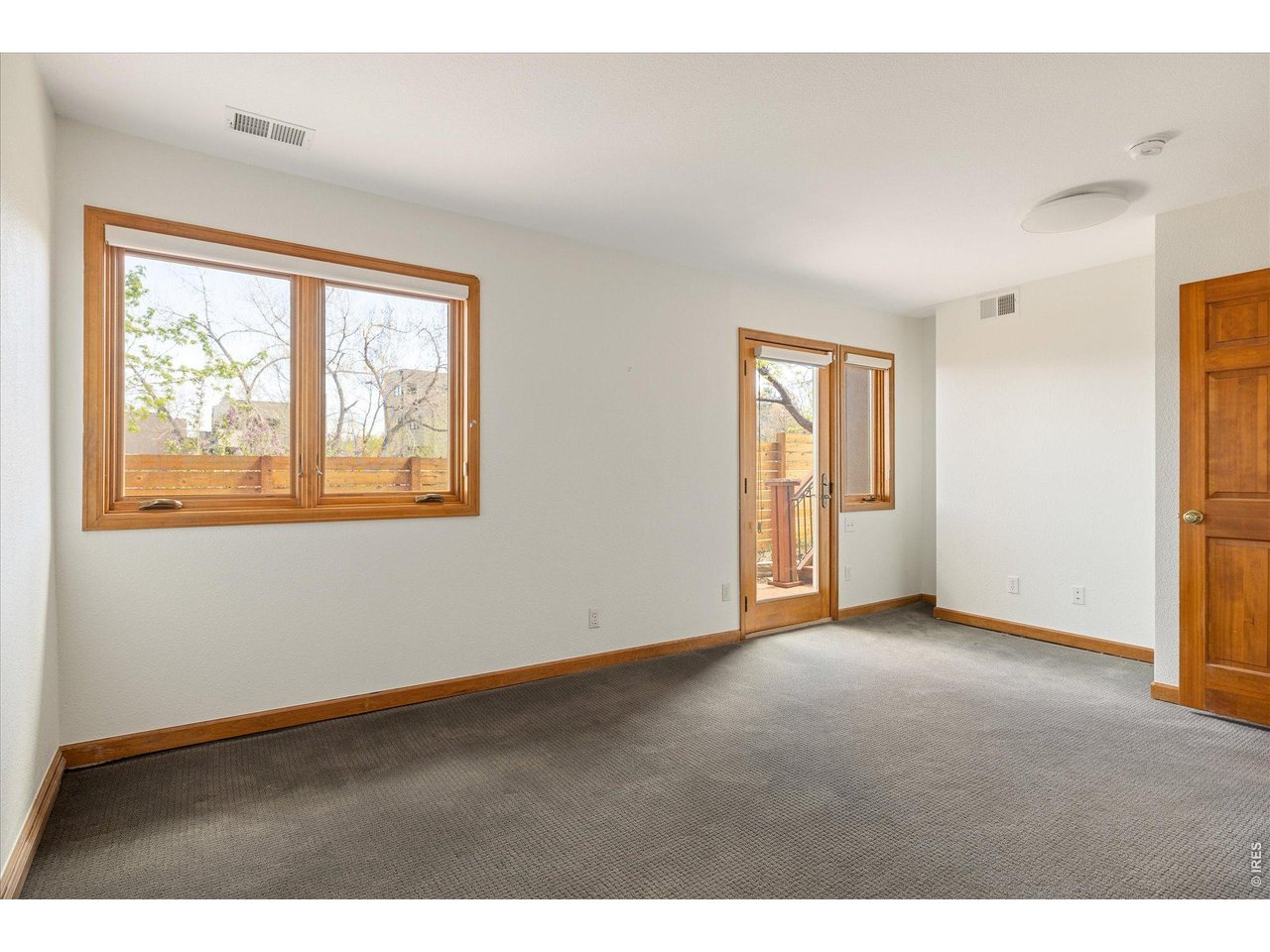 3966 Promontory Court Boulder, CO 80304 - Photo 27 of 42 a view of an empty room with a window