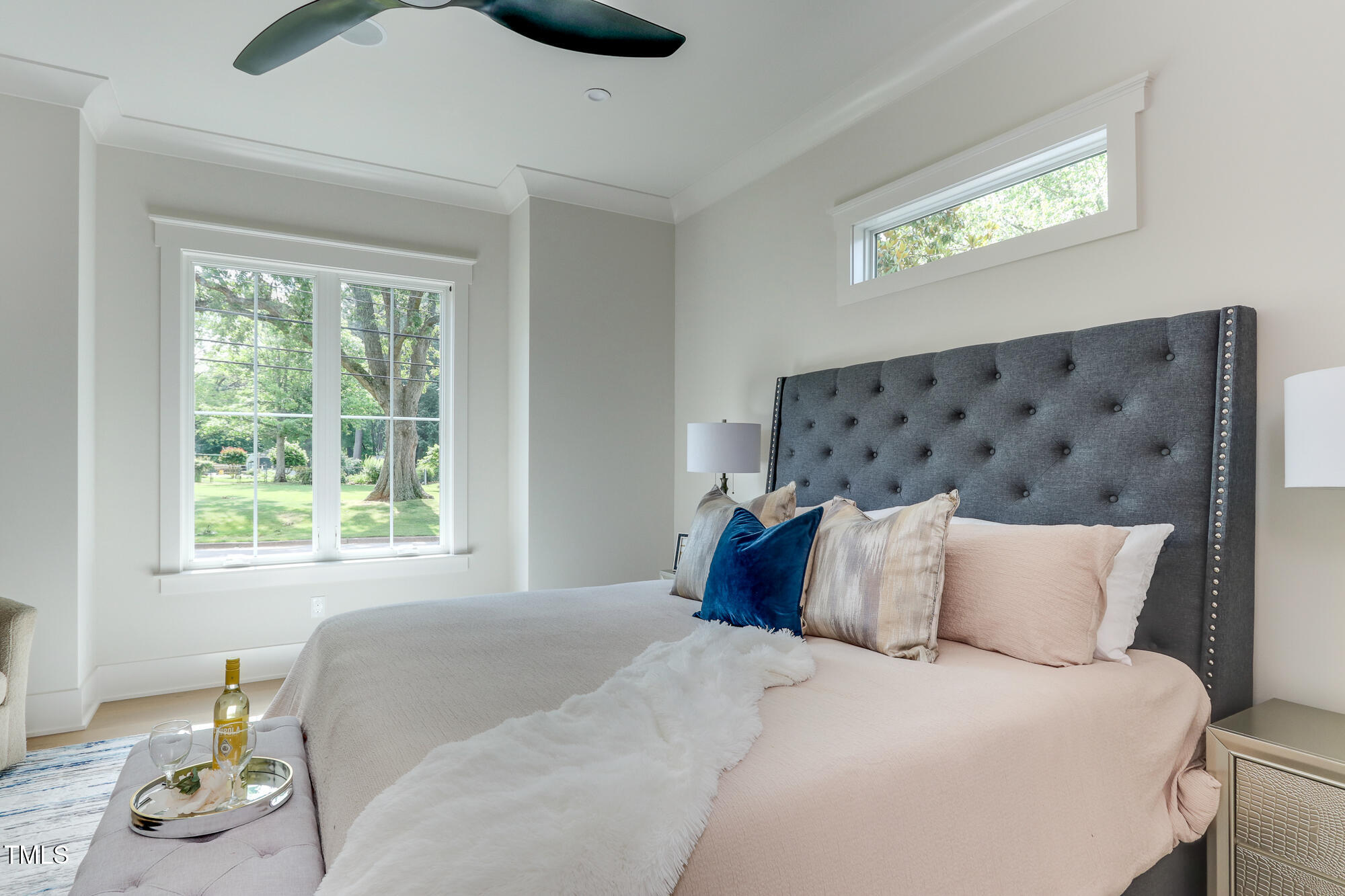 4921 Sweetbriar Drive Raleigh, NC 27609 - Photo 17 of 42 a bedroom with a bed and a window