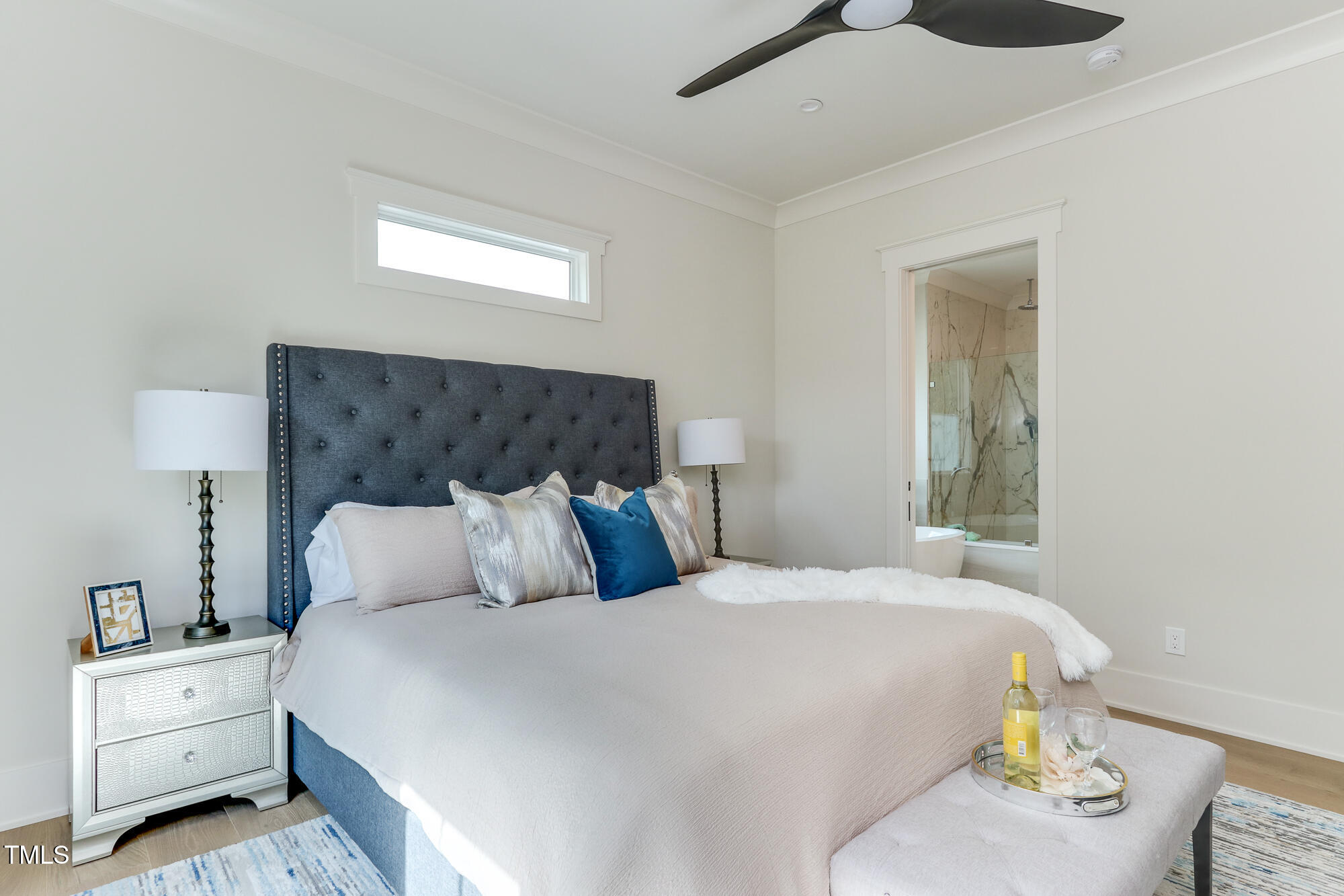 4921 Sweetbriar Drive Raleigh, NC 27609 - Photo 18 of 42 a bedroom with bed and window