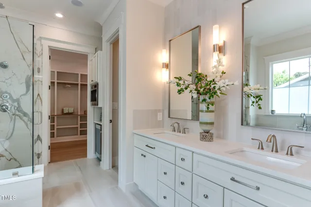 a bathroom with a bathtub and shower