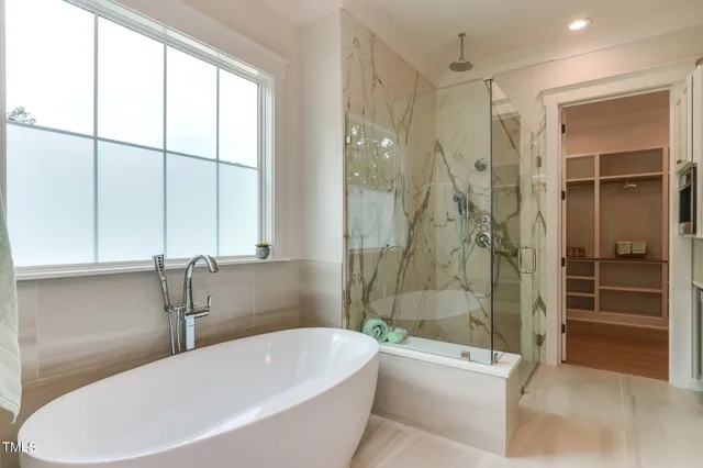 a kitchen with cabinets and window