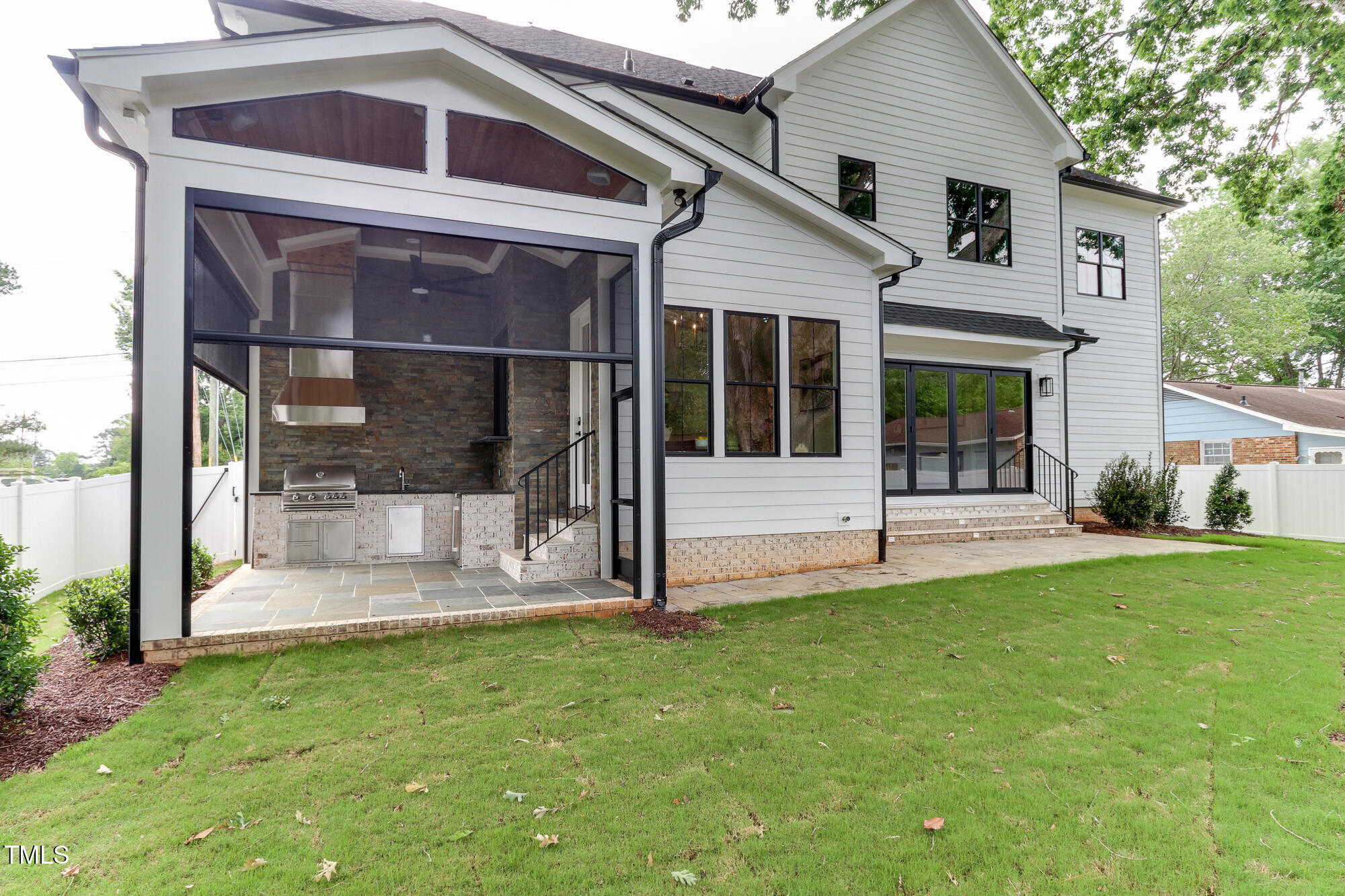 4921 Sweetbriar Drive Raleigh, NC 27609 - Photo 38 of 42 a front view of a house with a yard