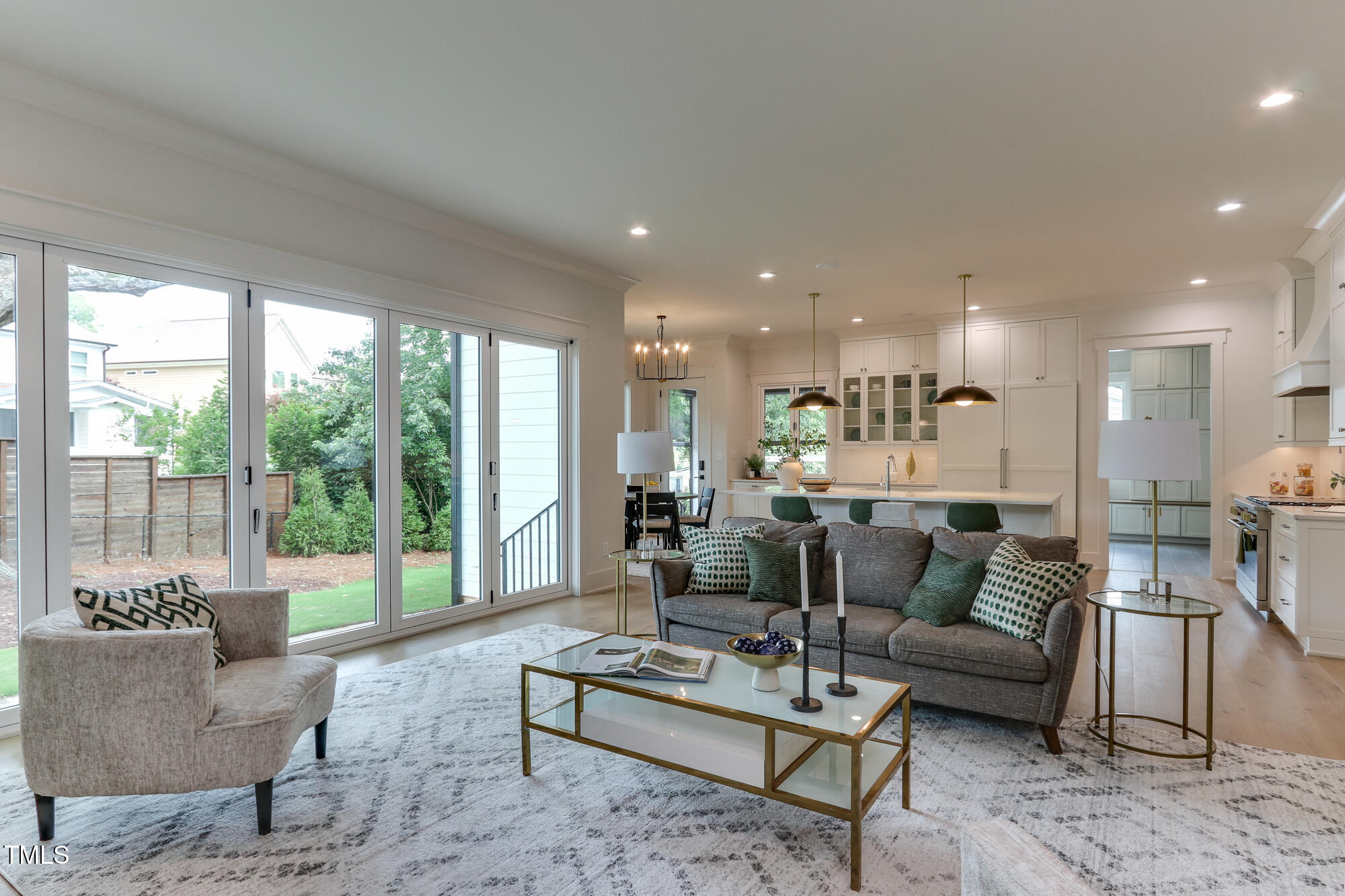 4921 Sweetbriar Drive Raleigh, NC 27609 - Photo 7 of 42 a living room with furniture and a large window
