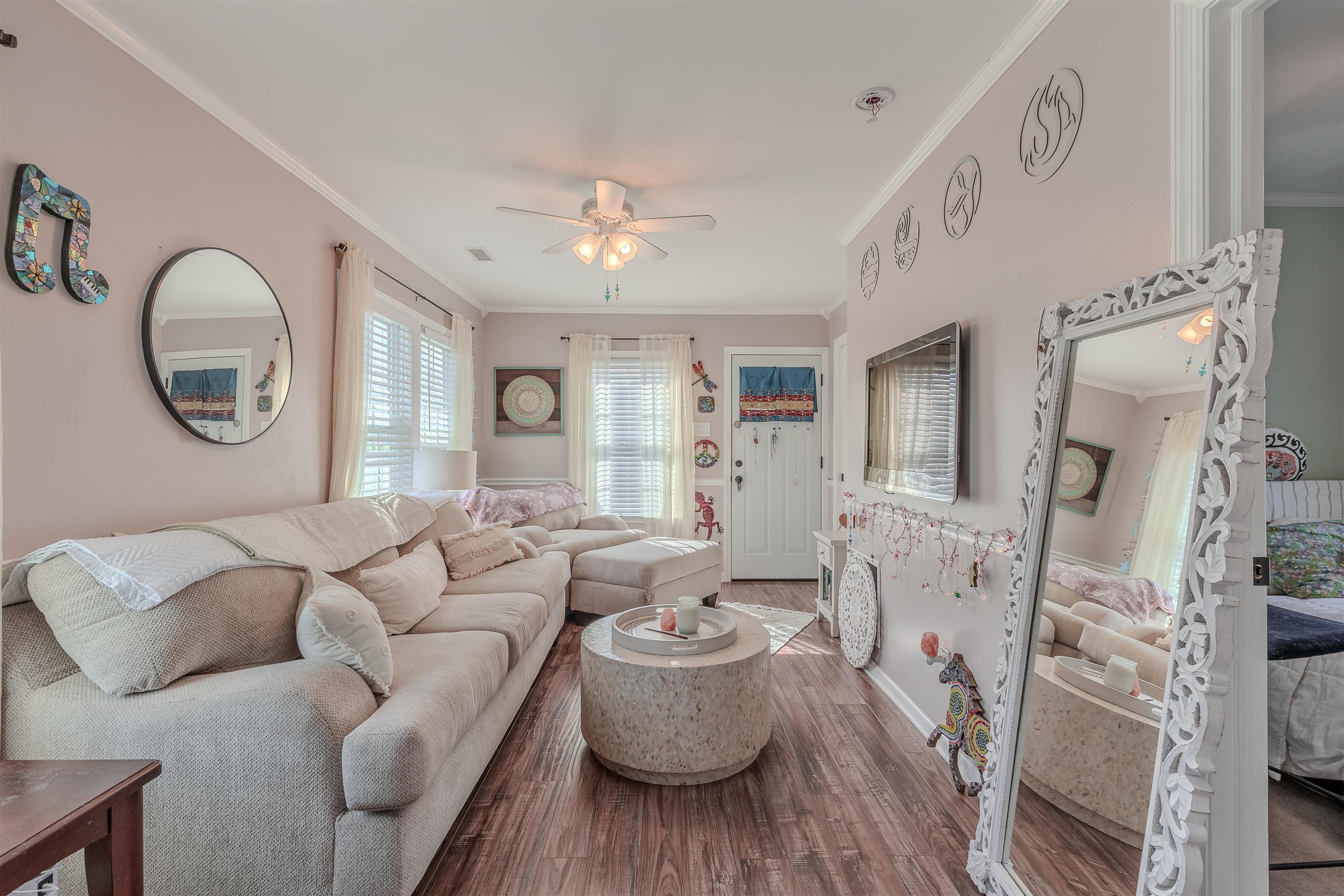 143 Arbor Road Villas, NJ 08251 - Photo 11 of 32 a living room with furniture and a large window
