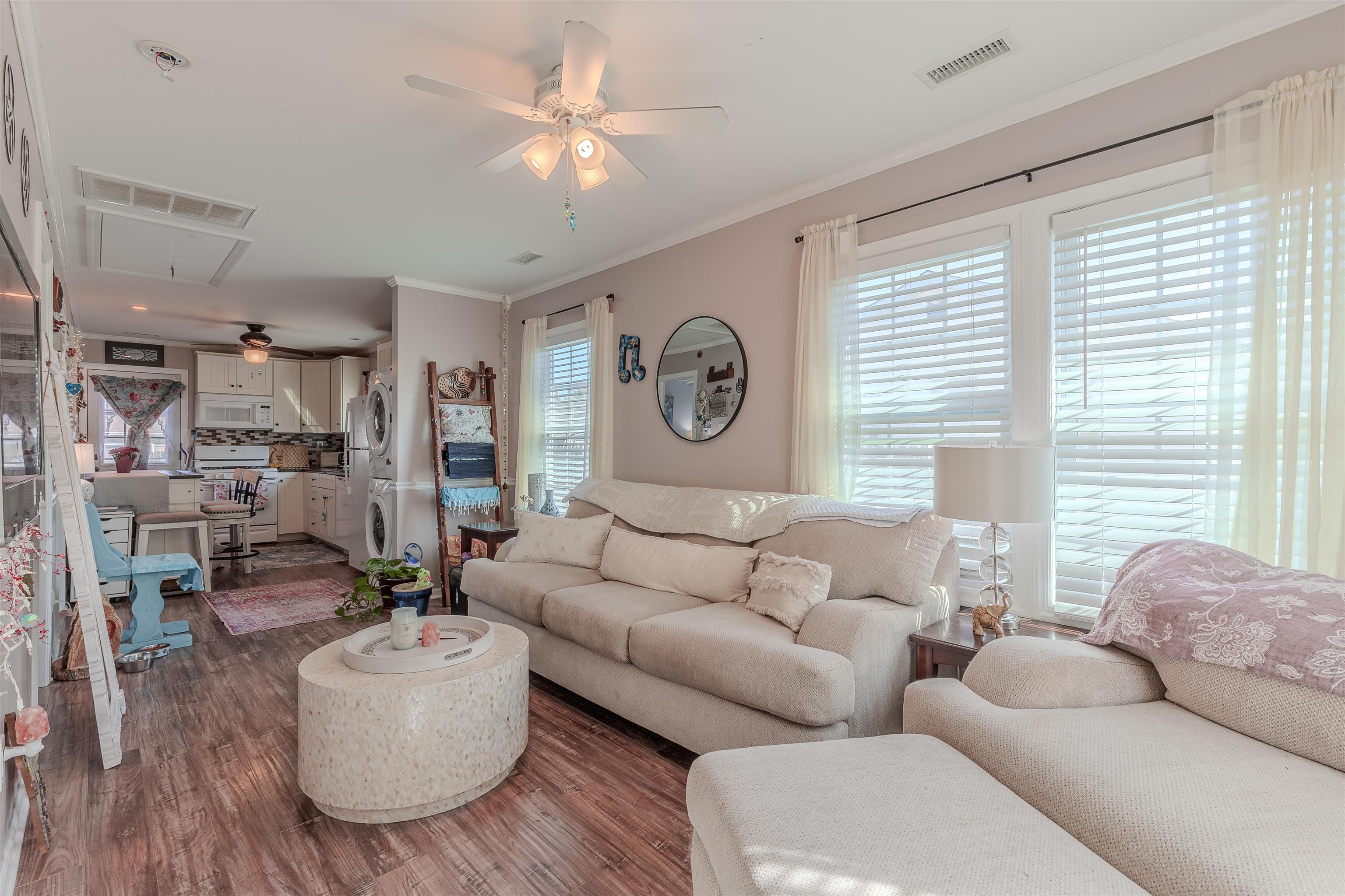 143 Arbor Road Villas, NJ 08251 - Photo 15 of 32 a living room with furniture and a large window