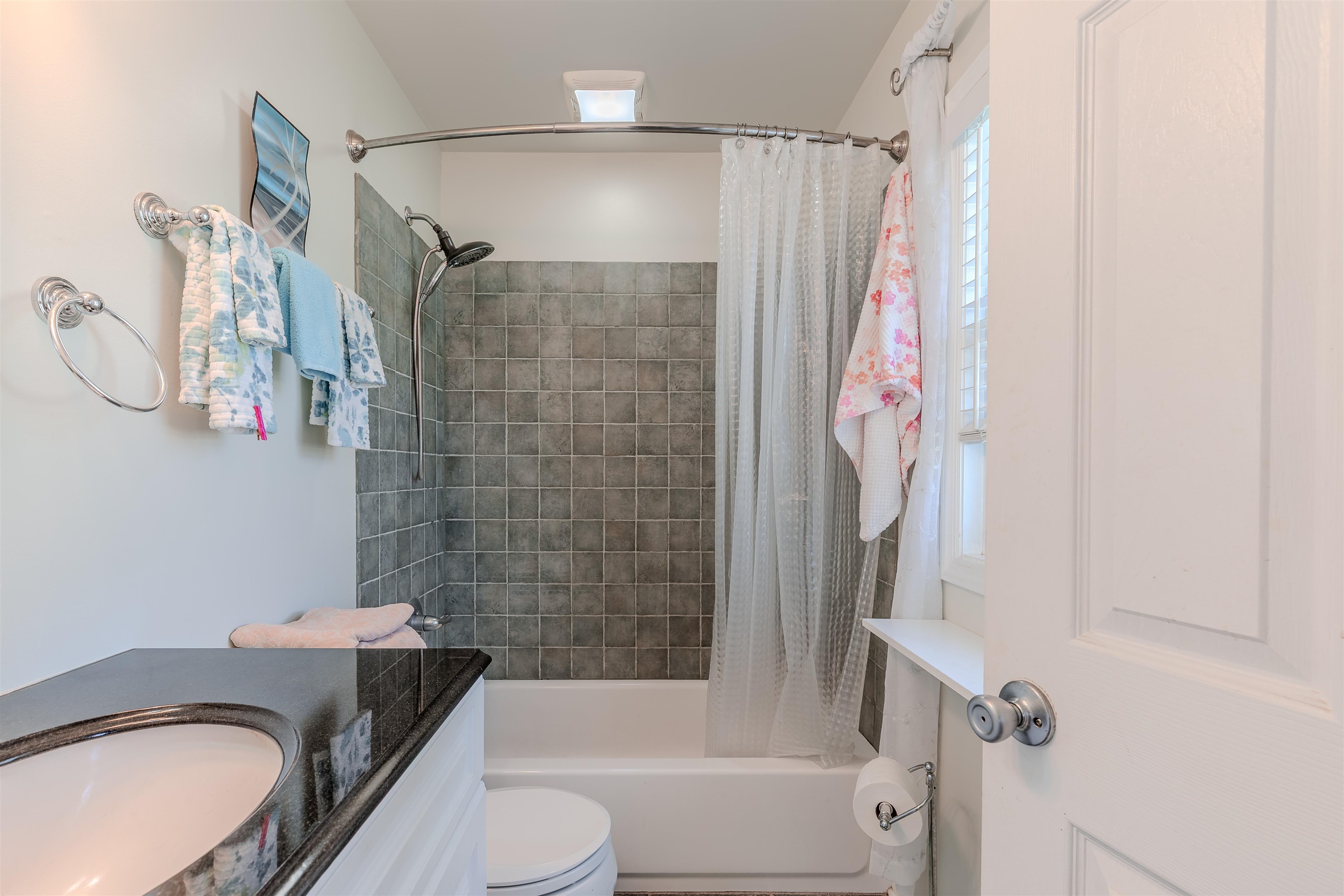 143 Arbor Road Villas, NJ 08251 - Photo 18 of 32 a bathroom with a granite countertop bathtub shower sink vanity and toilet