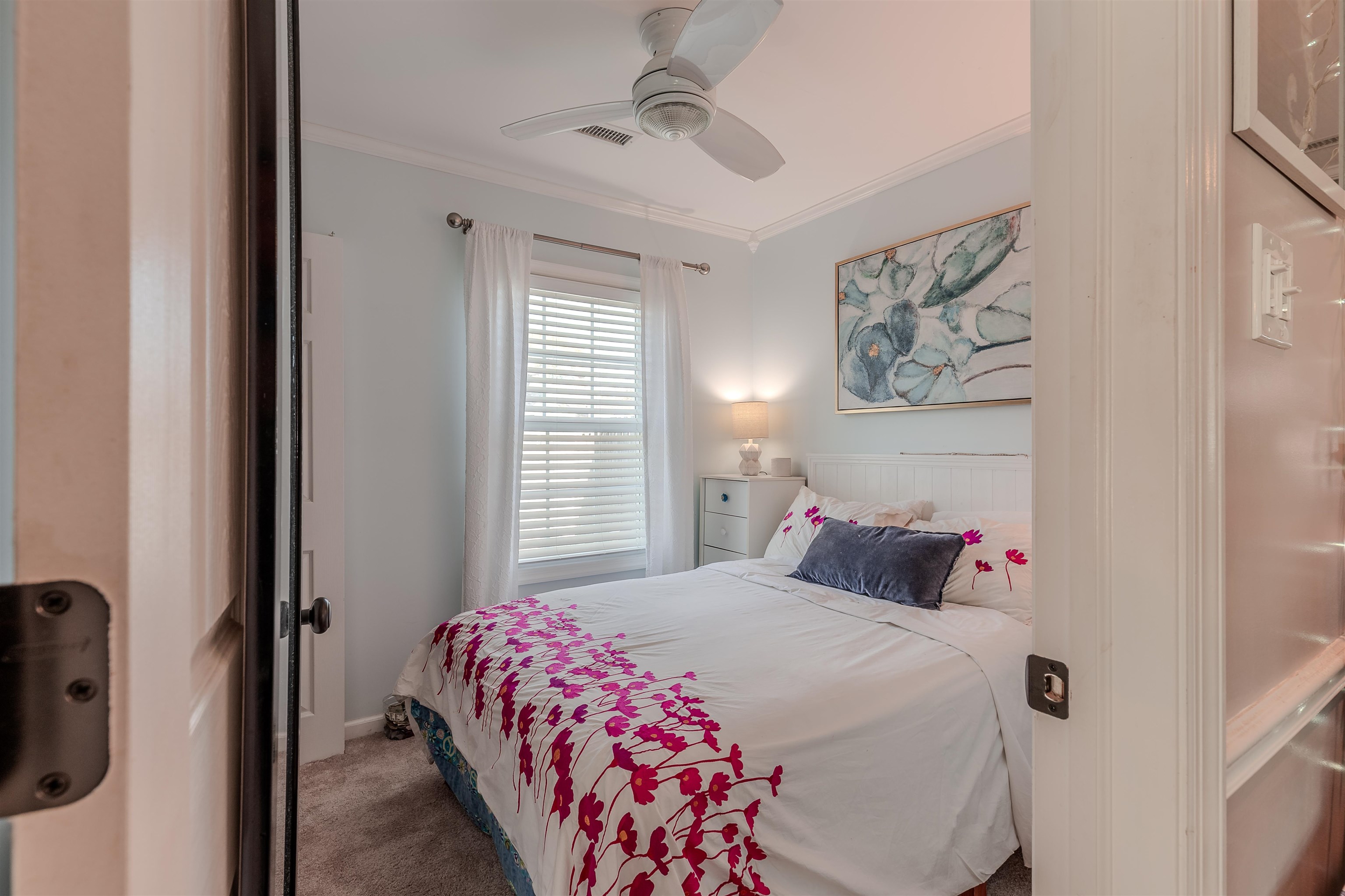 143 Arbor Road Villas, NJ 08251 - Photo 20 of 32 a bedroom with a bed and a window