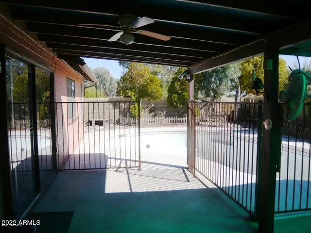 a view of a park with large trees