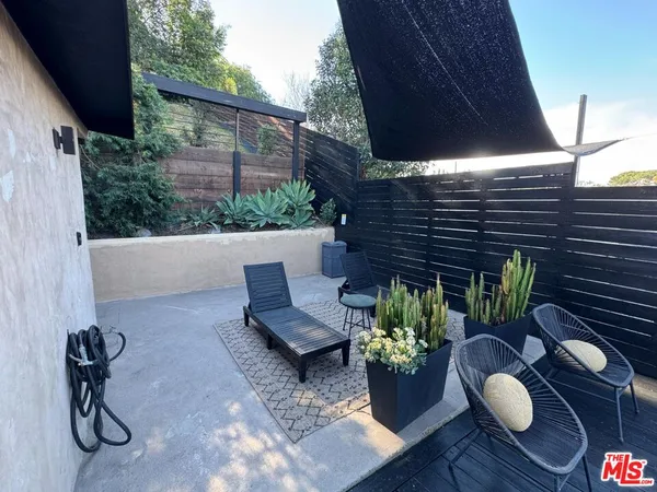 a front view of a house with patio
