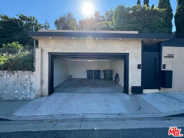 a view of fireplace and a wooden fence