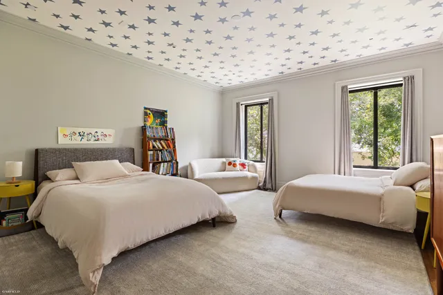 a bedroom with a bed and a walk in closet