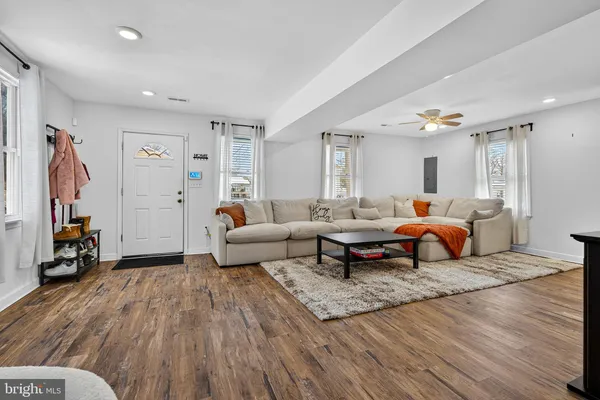 a view of a room with furniture window and wooden floor