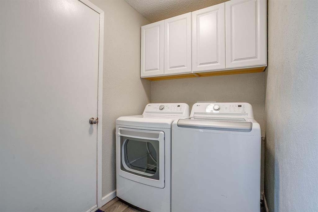 7312 Strawberry Way Fort Worth, TX 76137 - Photo 38 of 40 a utility room with dryer and washer