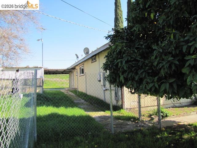 1943 South Ranchero Road Valley Springs, CA 95252 - Photo 8 of 21 View of side of property