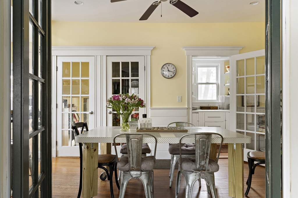 52 Hillside Road Watertown, MA 02472 - Photo 11 of 27 a view of a dining room with furniture and window
