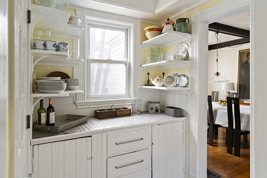 52 Hillside Road Watertown, MA 02472 - Photo 16 of 27 a kitchen with sink cabinets and window