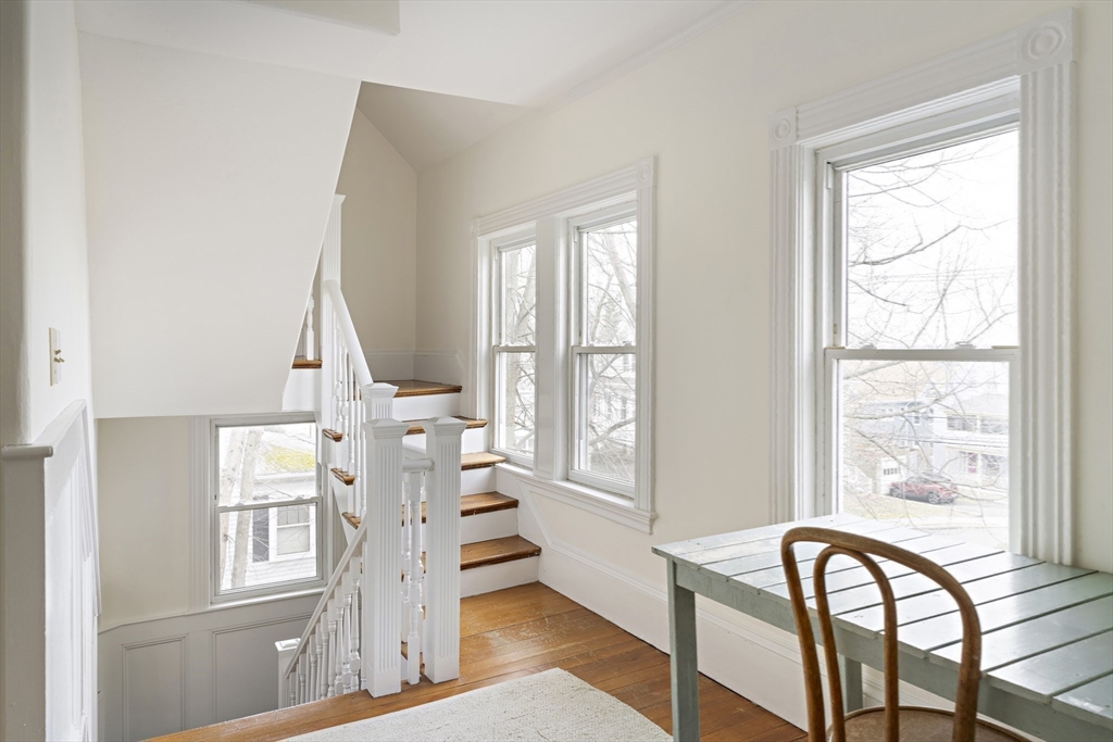 52 Hillside Road Watertown, MA 02472 - Photo 25 of 27 a view of a livingroom with furniture window and wooden floor