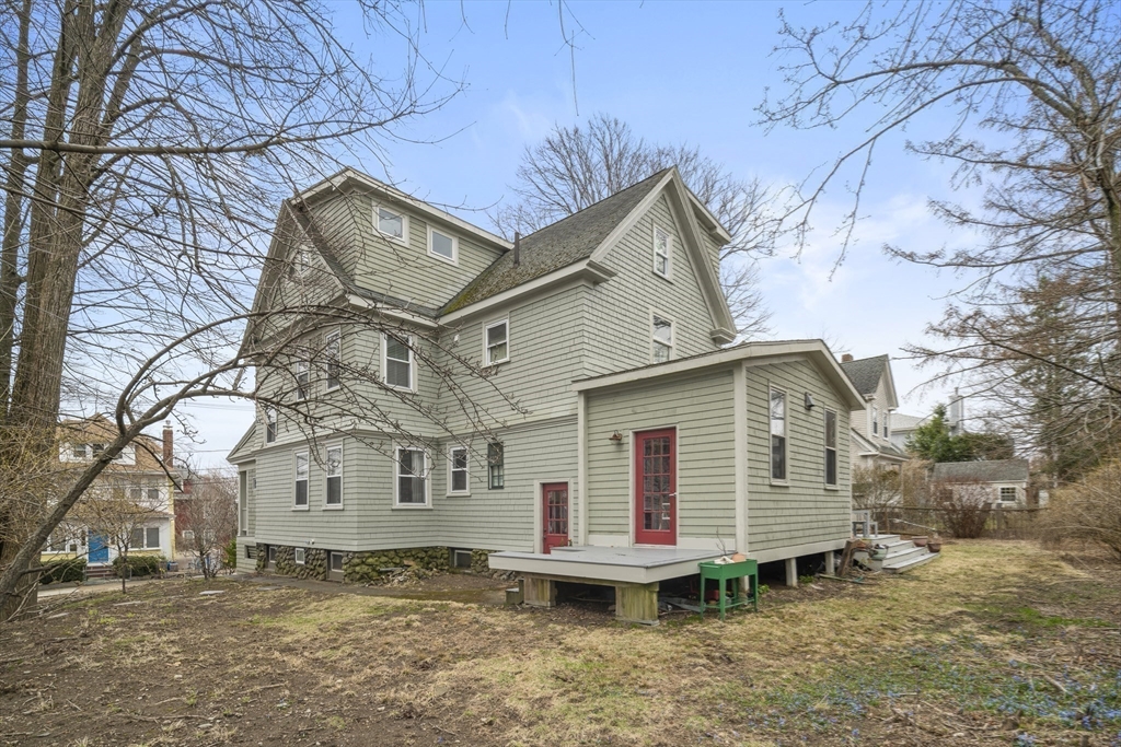 52 Hillside Road Watertown, MA 02472 - Photo 3 of 27 a view of a house with a yard