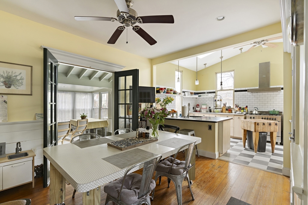 52 Hillside Road Watertown, MA 02472 - Photo 5 of 27 a view of a dining room with furniture and wooden floor