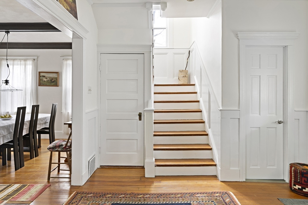 52 Hillside Road Watertown, MA 02472 - Photo 10 of 27 a view of entryway with wooden floor