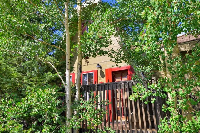 a sign that is on a tree