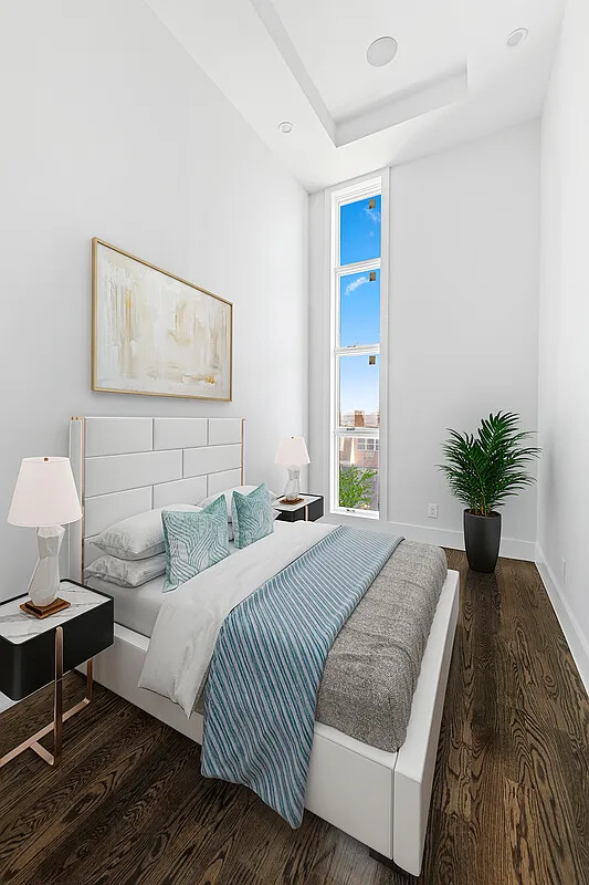 1137 Jefferson Avenue, Unit 3A Brooklyn, NY 11221 - Photo 4 of 10 a bedroom with a bed and a potted plant
