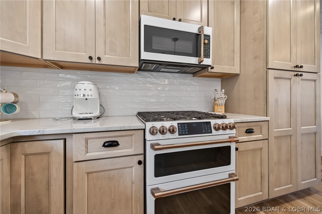 25 Old Sassafrass Road Eldon, MO 65026 - Photo 22 of 58 Beautiful gas range - pantry with pull outs.