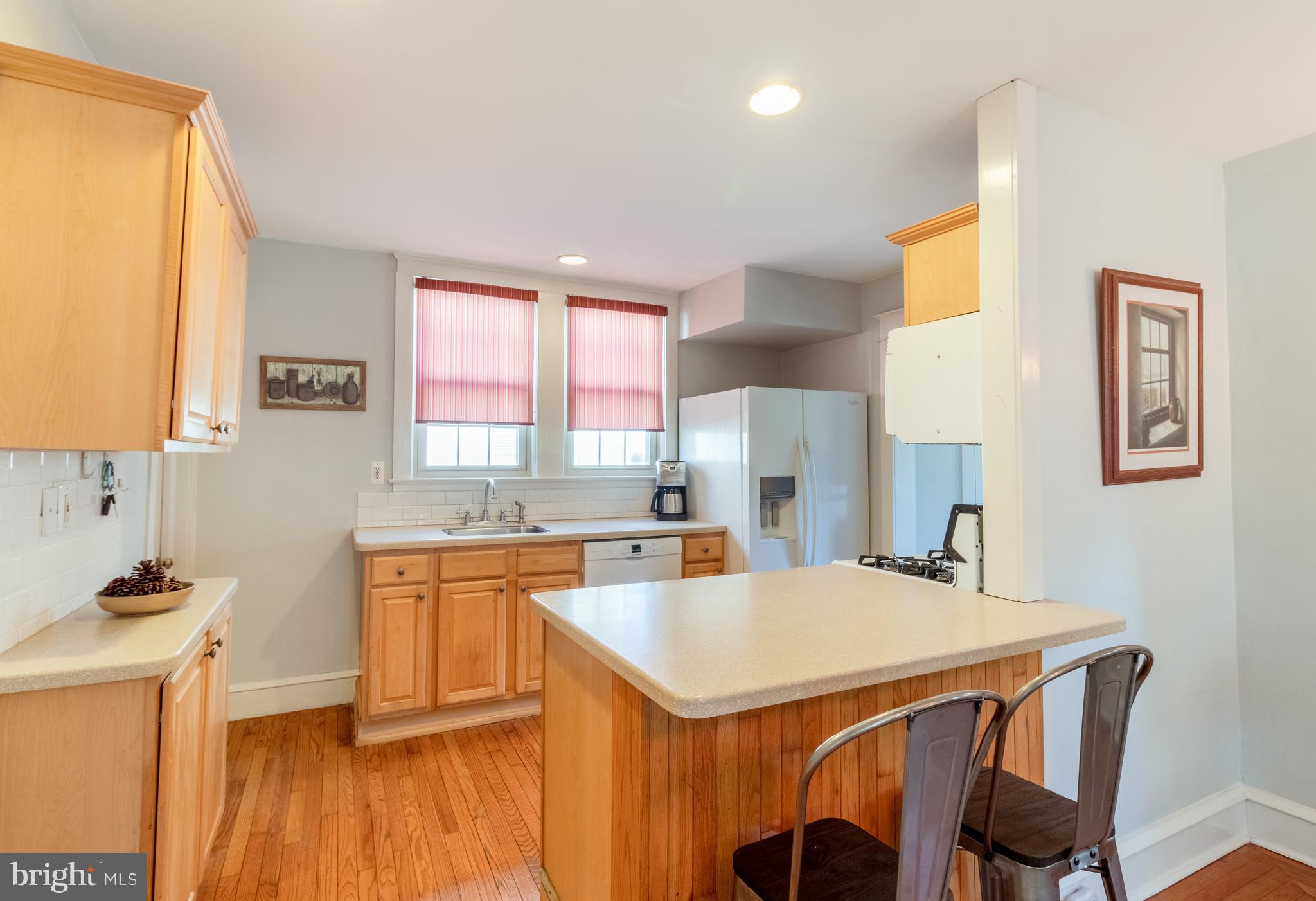 143 Powell Road Springfield, PA 19064 - Photo 12 of 28 Open Concept Kitchen w/ Breakfast Bar