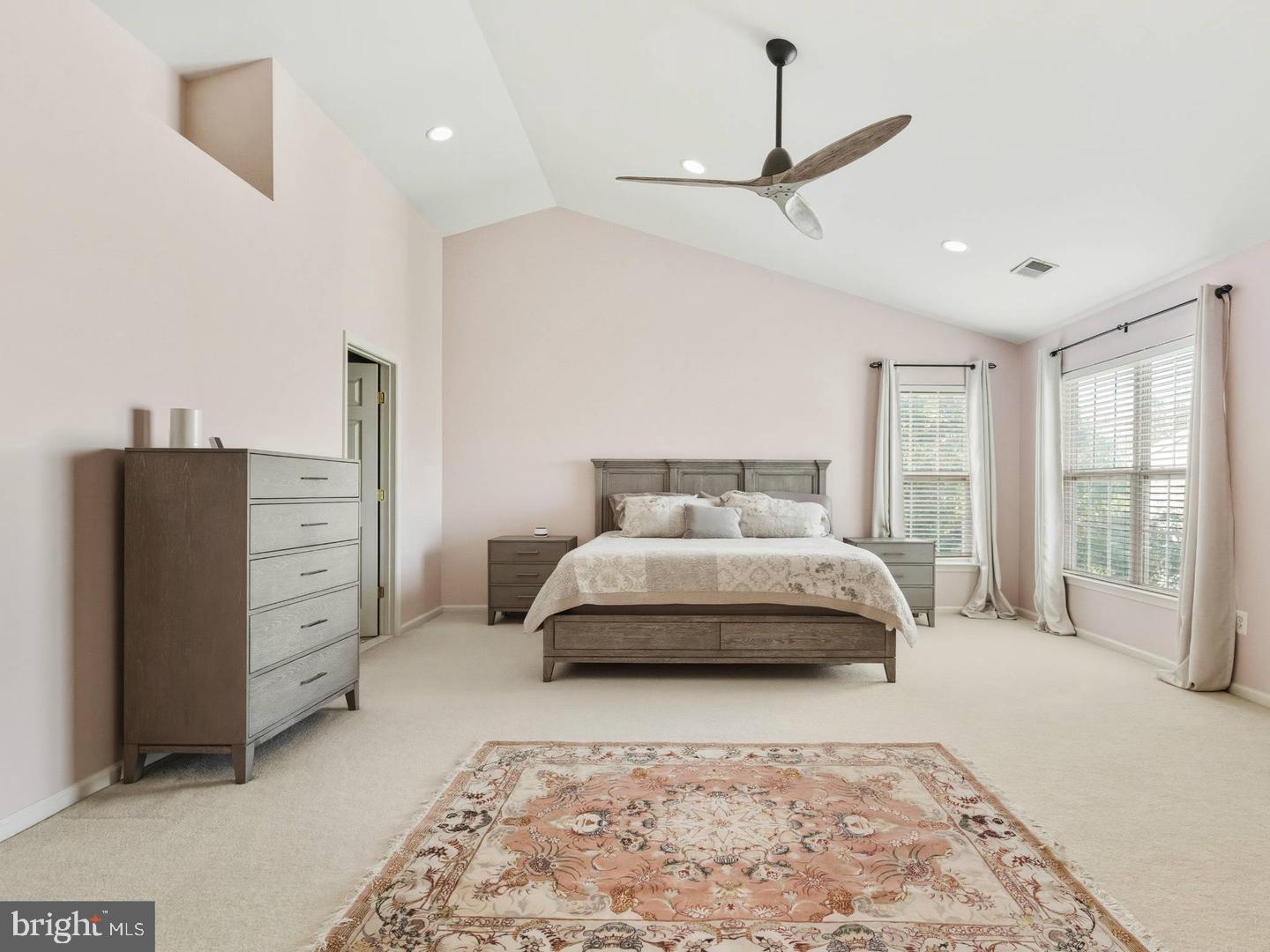 14301 Autumn Crest Road Boyds, MD 20841 - Photo 14 of 40 a spacious bedroom with a bed and a dresser