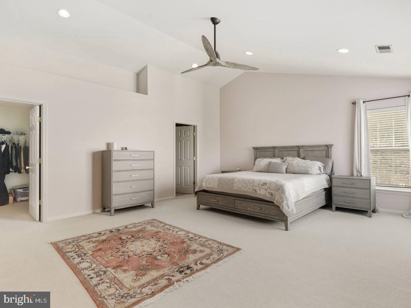 14301 Autumn Crest Road Boyds, MD 20841 - Photo 15 of 40 a bedroom with a bed dresser and a rug