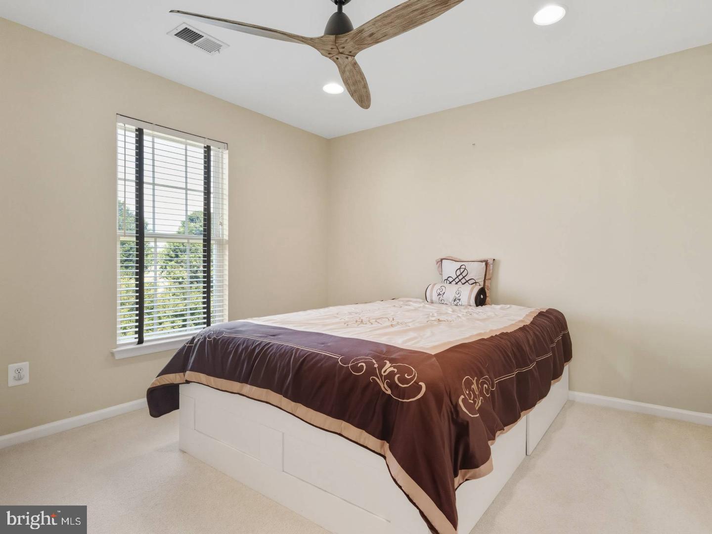 14301 Autumn Crest Road Boyds, MD 20841 - Photo 24 of 40 a bedroom with a bed and window