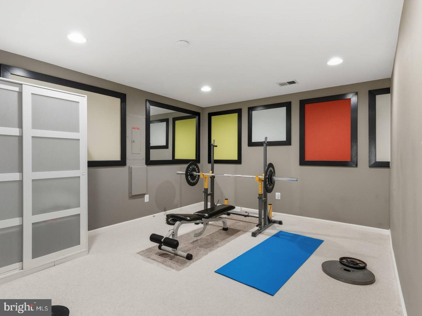14301 Autumn Crest Road Boyds, MD 20841 - Photo 33 of 40 a room with gym equipment and a large window