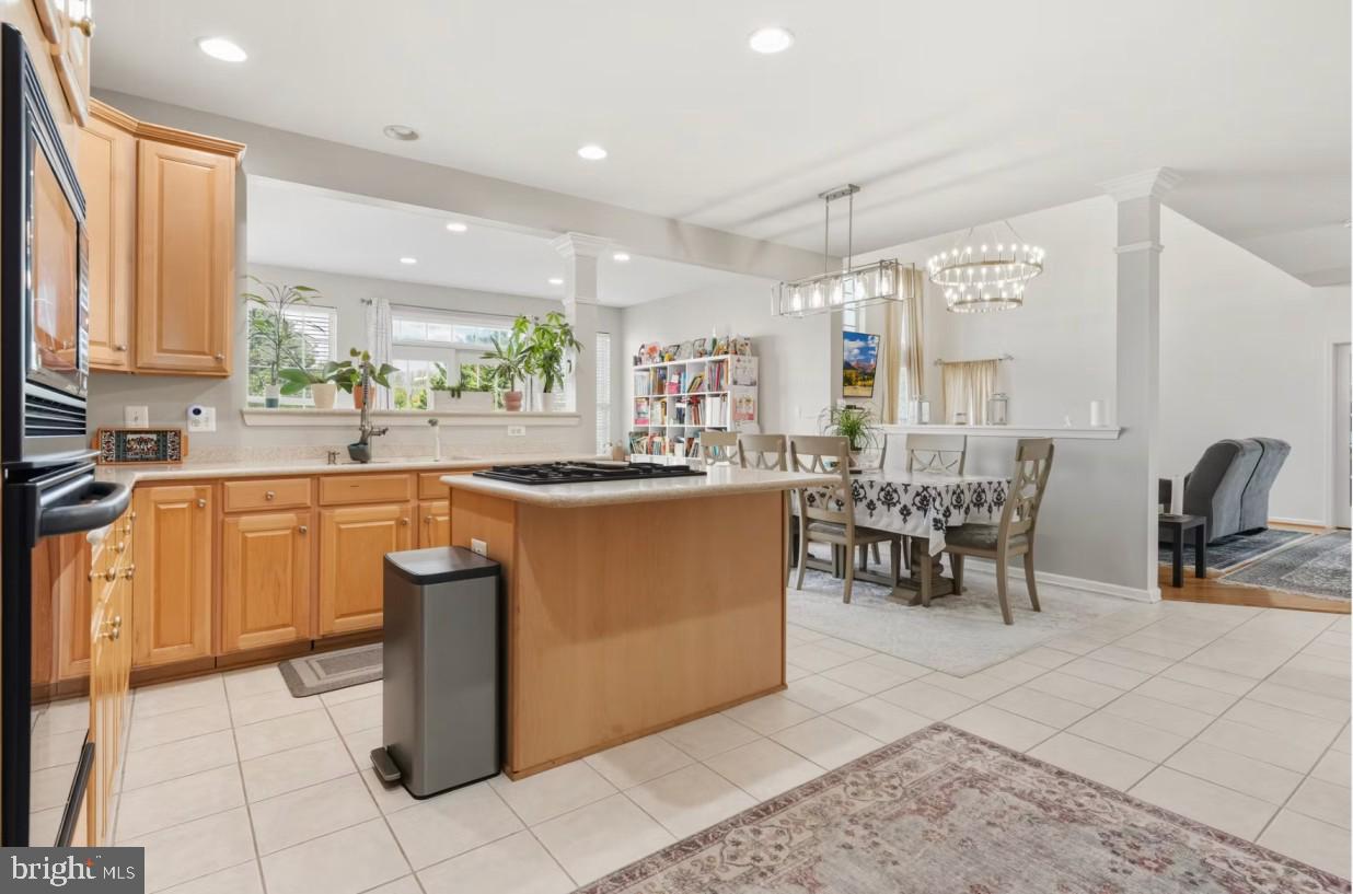 14301 Autumn Crest Road Boyds, MD 20841 - Photo 7 of 40 a kitchen with a sink a counter top space and appliances